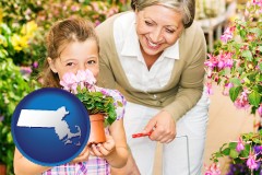 massachusetts map icon and a grandmother and her granddaughter at a garden center